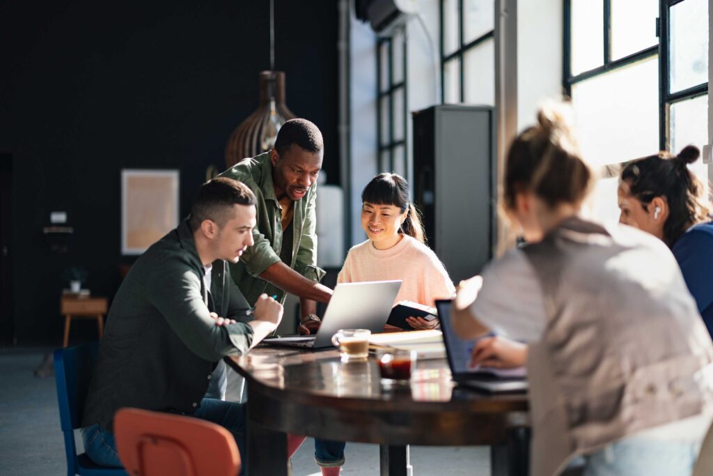 People working at a desk.