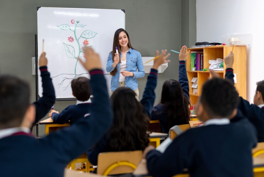A science teacher in a primary class.
