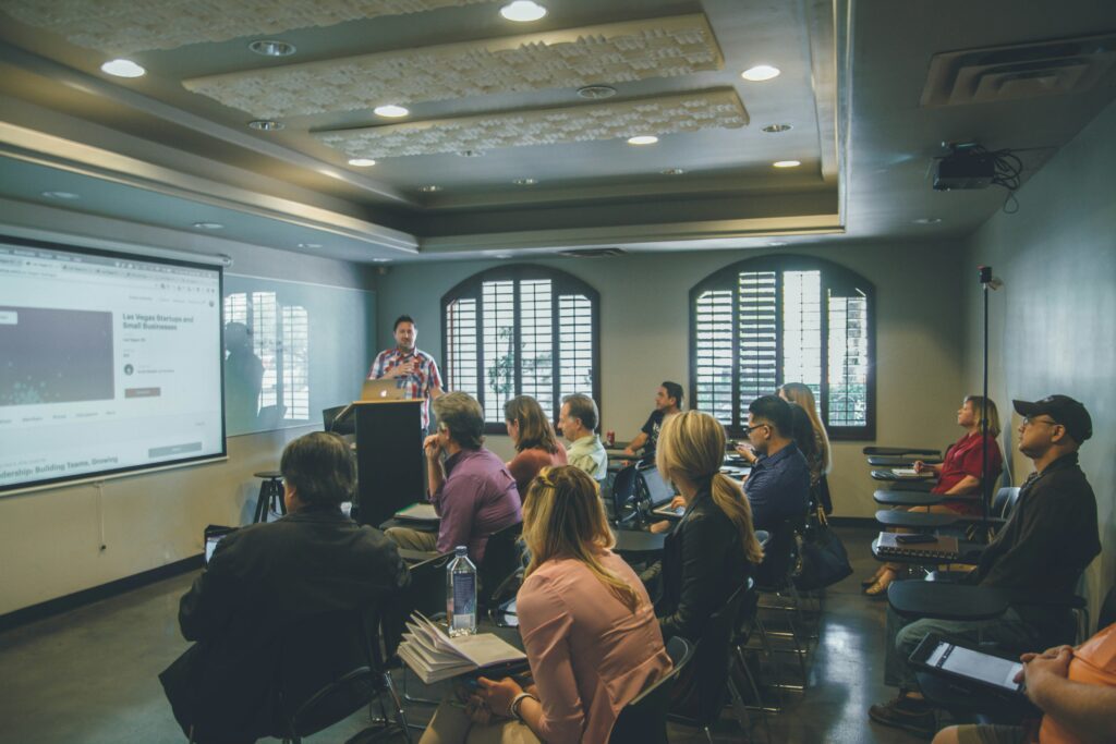 Lecturer and participants at a workshop.
